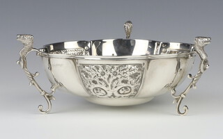 An Edwardian repousse silver scallop dish with mask and scroll legs, Chester 1903, 128 grams, 13cm 