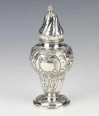 A Victorian repousse silver baluster shaker with floral decoration Birmingham 1894, 17cm, 175 grams 