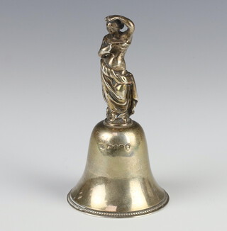 A Victorian silver bell with figural handle 11cm, 126 grams 