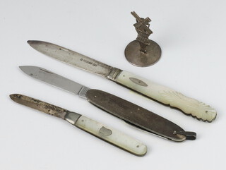 A Victorian silver and mother of pearl fruit knife Sheffield 1870, 2 other knives and a miniature silver windmill 