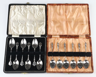 A set of 6 silver apostle spoons Birmingham 1909 and a set of 6 Edwardian silver teaspoons with shield ends London 1908, 102 grams, cased