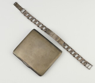 A silver engine turned cigarette case Birmingham 1930 together with an identity bracelet 143 grams 