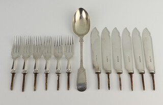 A Victorian silver dessert spoon, 6 silver fish knife and fork plates, 487 grams