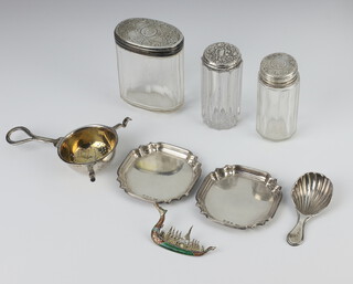 A pair of silver pin trays with Chippendale rims Birmingham 1914, tea strainer, caddy spoon, 3 silver mounted jars and sterling silver brooch weighable silver 119 grams