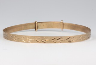 A 9ct yellow gold expanding bangle 6.5cm, 3.7 grams 