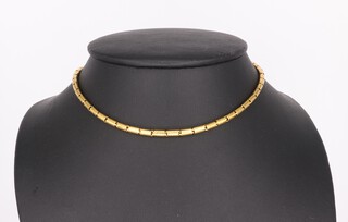 A yellow metal 995 percent bamboo style necklace, 33cm, 15.2 grams 