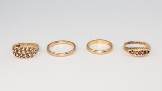 Three 9ct yellow gold rings sizes J 1/2, N 1/2, L 1/2, 8.3 grams, an 18ct ditto size N 1/2 1.2 grams 