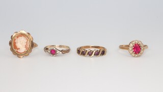 Four 9ct gold gem set rings sizes J, M, O and P 9.1 grams gross  