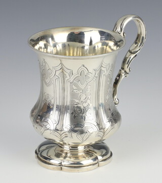 A Victorian repousse silver baluster mug with engraved monogram and S scroll handle London 1849, 178 grams, 11cm 