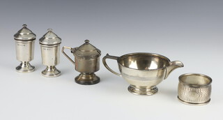 An Art Deco silver jug Birmingham 1927, 3 silver condiments and a napkin ring, 242 grams