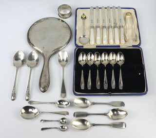 A cased set of silver coffee spoons and nips Birmingham 1928, 6 mother of pearl handled butter knives and minor cutlery, weighable silver 307 grams 