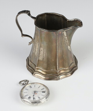 A hexagonal silver cream jug Birmingham 1906 95 grams together with a silver fob watch 