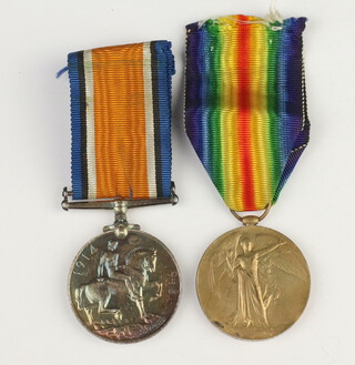 A First World War pair of medals - British War medal and Victory medal to 144582 GNR.G.Parker RA with reproduction photograph and short service paper