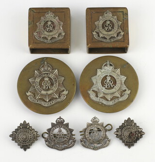 A collection of Second World War mounted and unmounted Army badges