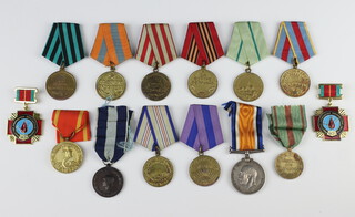 A First World War British War medal to 153306 GNR.F.H.Bush.R.A together with a collection of Russian medallions and medals 