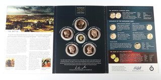 A commemorative cased set - The Battle of Waterloo 1815-2015 comprising 5 bronze medallions and a 14ct ditto 7 grams 