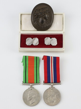 A pair of World War Two medals - Defence and War medal together with  a pair of cufflinks and a brooch 