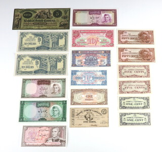 Four Iranian bank notes, 4 British Armed Forces bank notes, 8 Japanese Government bank notes and 2 American Civil War bank notes 