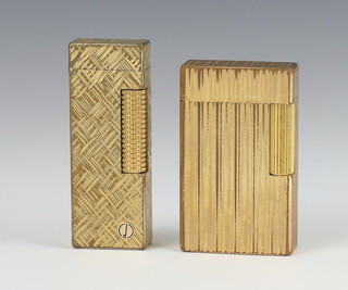 A gentleman's Dupont gold plated cigarette lighter and a Dunhill ditto 
