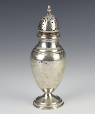 A baluster silver shaker of plain form London 1911, 18cm, 200 grams