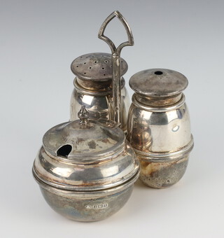 A silver 3 piece condiment on a ditto stand Birmingham 1951, 144 grams 