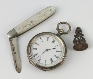 A lady's Edwardian silver cased fob watch, fruit knife and a seal 