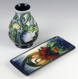 A modern Moorcroft pin tray 1998 9cm, together with a squat vase decorated with flowers 1996 13.5cm 
