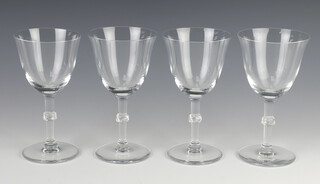 Four Lalique wine glasses with twist knops, lower cased engraved marks 15cm 