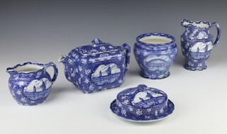 A Maling Ware transfer print blue and white teapot 1929 NE Coast Industries Exhibition Newcastle Upon Tyne 22cm, a ditto butter dish and cover, 2 jugs and a vase 