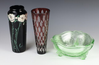 A Bohemian tapered red glass vase 24cm, a moulded Art Deco bowl 20cm and a Studio Pottery vase decorated with flowers 25cm 