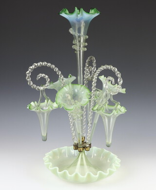 A Victorian vaseline glass 7 trumpet centrepiece/epergne with twist clear glass stems 53cm 