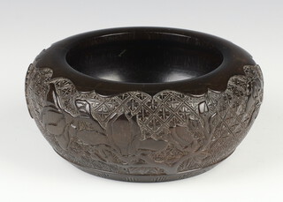 A Chinese carved hardwood bowl decorated with magnolias 13cm 