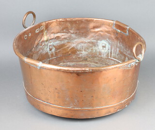 A circular 19th Century twin handled copper copper 26cm h x 53cm 