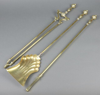 A brass 3 piece fireside companion set comprising shovel, poker and tongs 