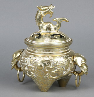 A Japanese polished bronze twin handled censor the body decorated dragons and with elephant mask handles 23cm h x 16cm 