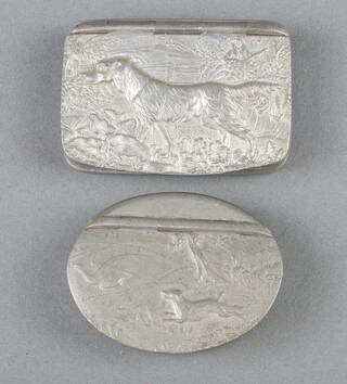 James Dixon & Sons, an oval pewter snuff box, the lid embossed a spaniel flushing a pheasant base marked L1459 1cm x 5cm x 4cm, 1 other the lid decorated a retriever  base marked L1461 1cm x 6cm x 4cm 