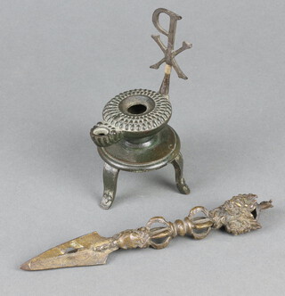 A bronze Roman style oil lamp decorated a Chi Rho 13cm x 6cm together with a miniature pierced bronze spear 19cm  