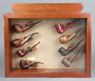 Two Dunhill pipes, 1 marked Bruyere 1205, the other Bruyere 2102,  3 James Upshall pipes and 3 pipes marked Tilshed, 1 marked 3, 1 marked 4, contained in a mahogany wall display cabinet 
