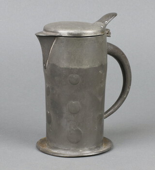 An Art Nouveau English pewter Tudric hot water jug in the style of Archibald Knox, the body embossed heart shaped apples, the base marked RD42110 Tudric O279 15cm h 