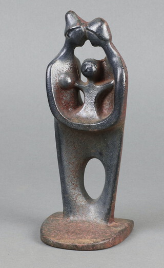 A cast iron figure of a standing parent and child, the back marked R 20cm h x 7cm w x 7cm d 
