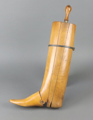 Peal and Co, a 19th Century beech right foot articulated boot tree with brass panel marked Noel E Burton Esquire, Peale & Co  makers 47cm h x 30cm x 9cm  