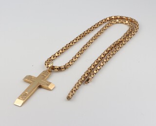 A yellow metal 9ct cross pendant and a chain, gross weight 10 grams 