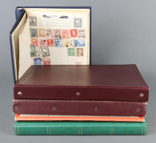 A stock book of Elizabeth II mint GB stamps and various world stamps, a Stanley Gibbons postage stamp album of used world stamps, brown album of used world stars - Spain, France, Finland, Egypt, a blue Quick Change album of used stamps including GB, Germany, France 