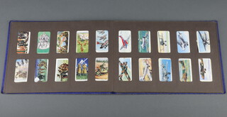 Three sets of Players cigarette cards - World War Two Ships, Aircraft and Cricketers together with a Wills set of cigarette cards - Air Raid Precautions 
