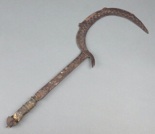 An ancient eastern sickle with crescent shaped blade and snakeskin handle 54cm
