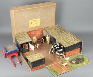 The Forest Toys Brockenhurst, by Frank Whittington, a fold out diorama of a farmyard contained in a cardboard case consisting of pig sty, stables and barns and a duck pond together with a number of wooden hand carved and painted New Forrest Toys figures including 3 Friesians and calf, cart horse (leg broken but present) and cart, 3 geese and a wire haired Fox Terrier 50cm w x 41cm d (box size)  (NB - A similar example was sold at Denham's in July 2023 for 3,300 with 25 figures)
