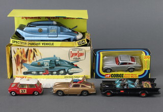 Corgi Toys, a James Bond Aston Martin DB5 No 270 in silver, boxed with insert and ejecting figure together with an unboxed earlier DB5 No 261 in gold with ejecting figure, an unboxed Batmobile in gloss black with pulsating flame (no tow bar) No 267, a Mini Monte Carlo rally car and a Dinky Toys, a Captain Scarlet Spectrum Pursuit vehicle No 104, boxed with insert 