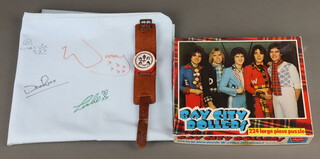 A Bay City Rollers watch, mug and signed pillow case, won in an Oh Boy competition 