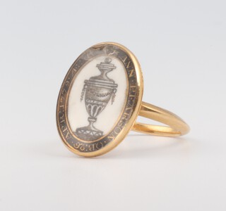 An 18th Century yellow metal and enamelled oval mourning ring inscribed Ann Pearson OB.26.APR.1779 size G 1/2, 3.2 grams 