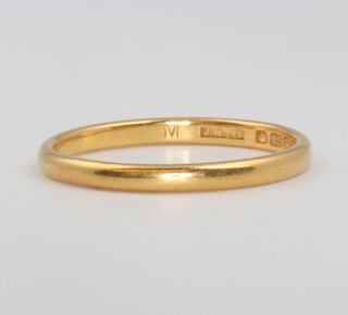 A 22ct yellow gold wedding band 2.9 grams, size T